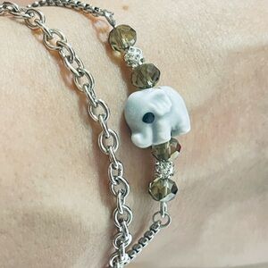 Handmade White Elephant Bead Bracelet with Smoky Crystal Accents